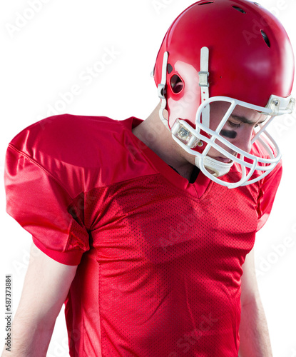 A football player taking his helmet on her head 