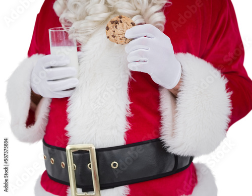 Santa holding cookie and glass of milk