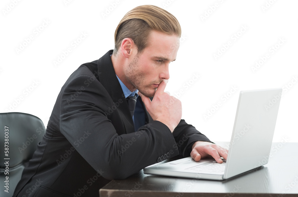 Concentrated businessman using laptop at desk Concentrated businessman using laptop at desk