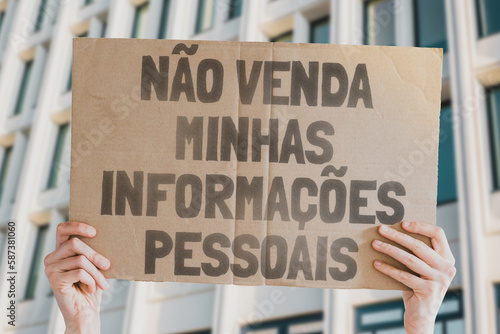 Wallpaper Mural The phrase " Do not sell my info " is on a banner in men's hands. Cyber. Private information. Info. Privacy. Internet. Safety. Web. Technology. Consumer. Encryption. Breach. Firewall. Vulnerability Torontodigital.ca