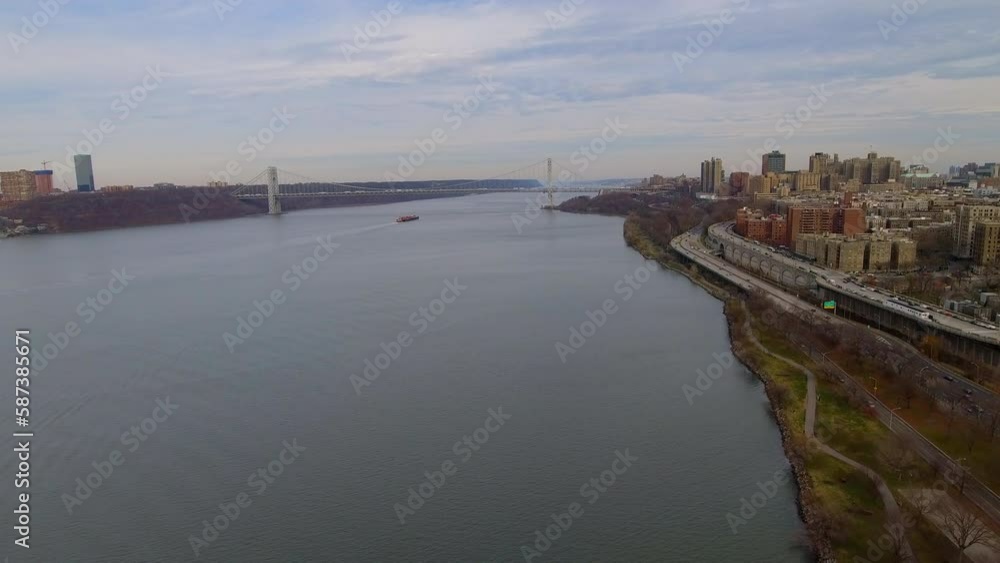Aerial Shot Of George Washington Bridge, Drone Flying Forward Over Hudson River In City - New York City, New York Aerial Shot Of George Washington Bridge, Drone Flying Forward Over Hudson River In City - New York City, New York