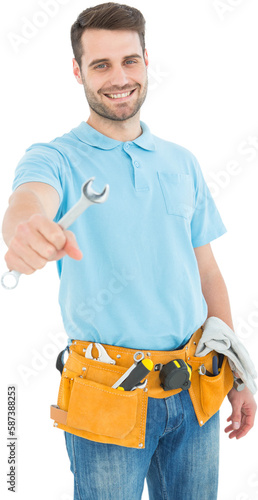 Smiling construciton worker holding wrench