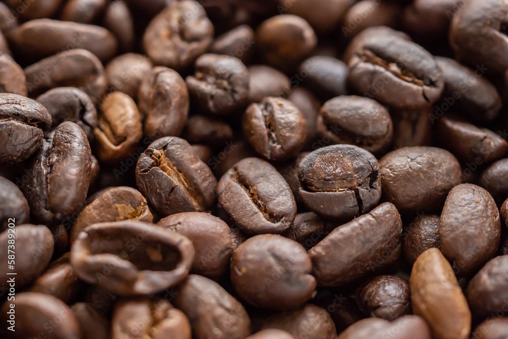 Fresh roasted brown coffee beans background