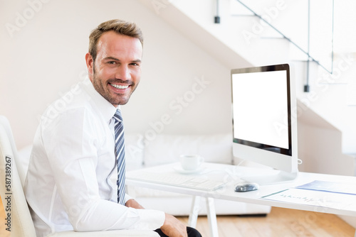 Portrait of happy businessman