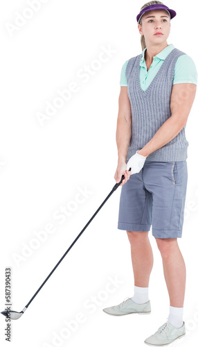 Pretty blonde playing golf