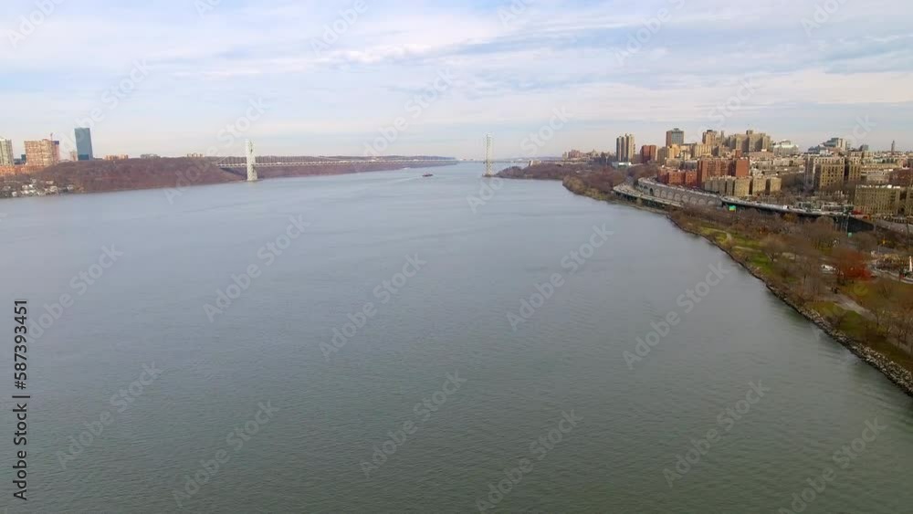 Aerial Shot Of George Washington Bridge, Drone Flying Backward Over Hudson River In City - New York City, New York Aerial Shot Of George Washington Bridge, Drone Flying Backward Over Hudson River In City - New York City, New York