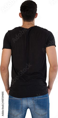 Rear view of man standing with hands in pocket