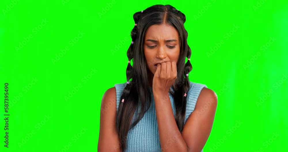 Face, green screen and woman bite nail, anxiety and stress against a studio background. Portrait, female and lady feeling anxious, worried and thinking with depression, mental health and frustration Face, green screen and woman bite nail, anxiety and stress against a studio background. Portrait, female and lady feeling anxious, worried and thinking with depression, mental health and frustration