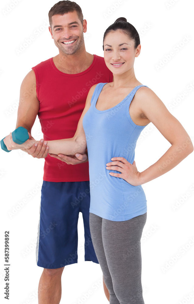 Fit woman and trainer smiling at camera Fit woman and trainer smiling at camera