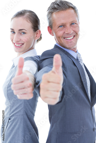 Portrait of smiling business people gesturing thumbs up