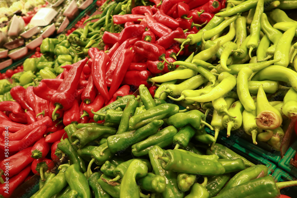 green and red capsicum displaying at shop green and red capsicum displaying at shop