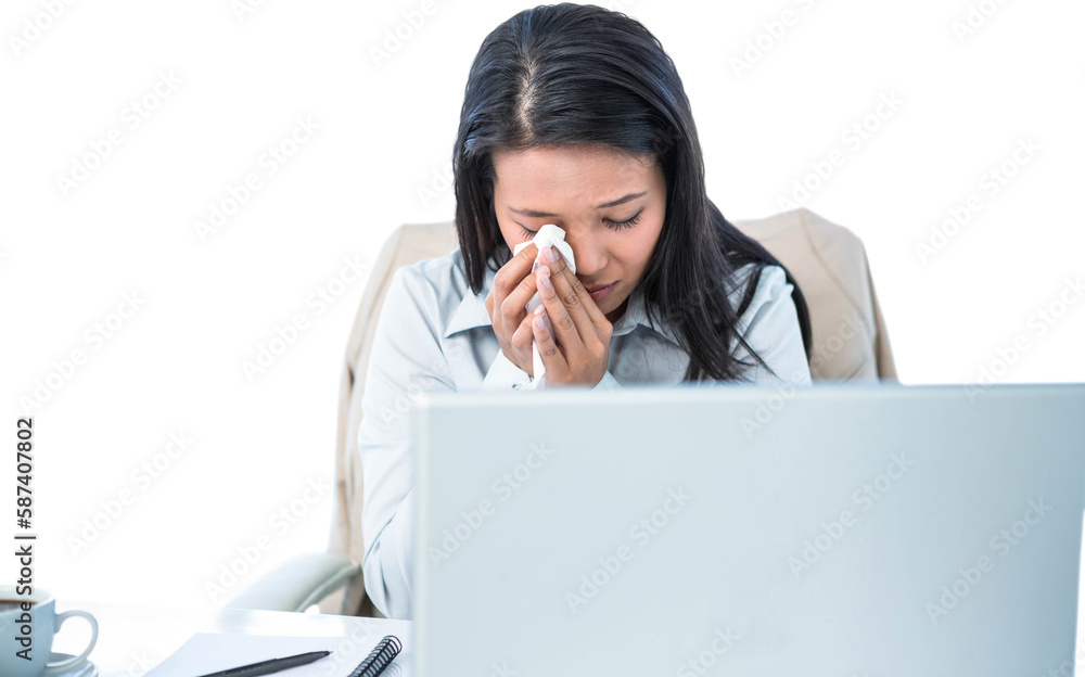 Sad businesswoman wiping her tears Sad businesswoman wiping her tears