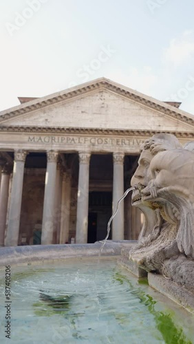 Facade of pantheon in Rome city italy. Vertical shot
 photo