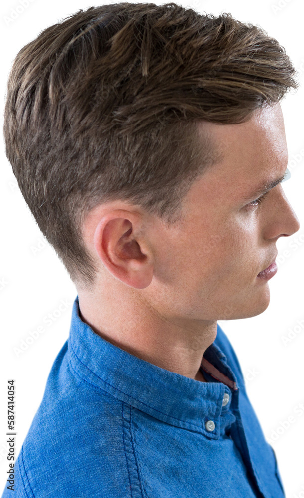Fototapeta premium Young man standing against white background