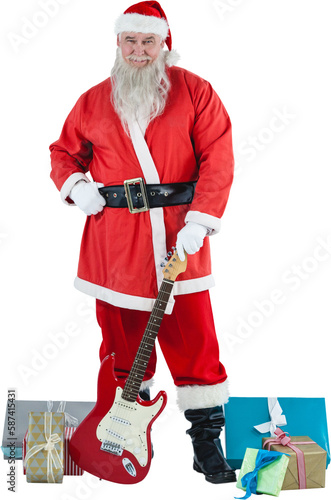 Portrait of Santa Claus standing with guitar and gift boxes