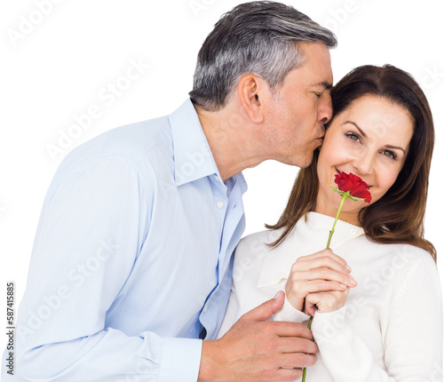 Portrait of wife holding rose with husband