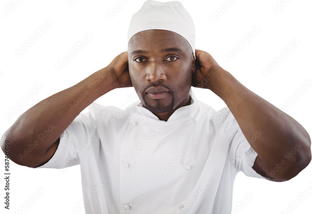Portrait of chef adjusting hat Portrait of chef adjusting hat