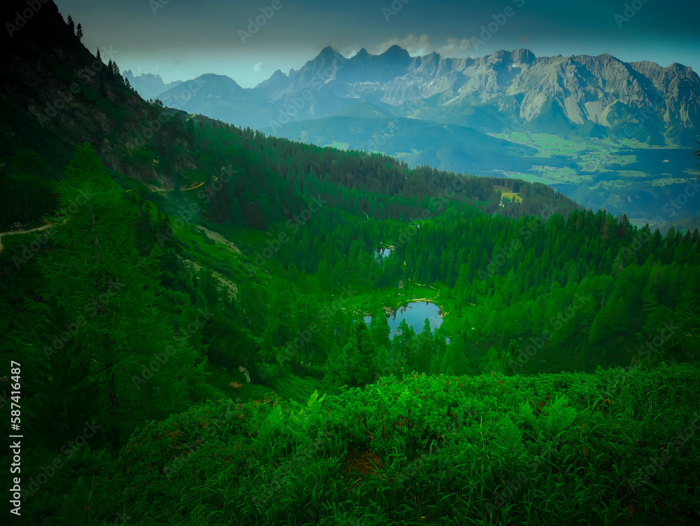 Scenic mountain landscape with view to beautiful valley and mountain peaks
