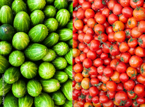 Delicious red tomatoes and fresh green cucumbers for the background concept. 