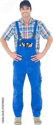 Portrait of confident plumber with hands on hip