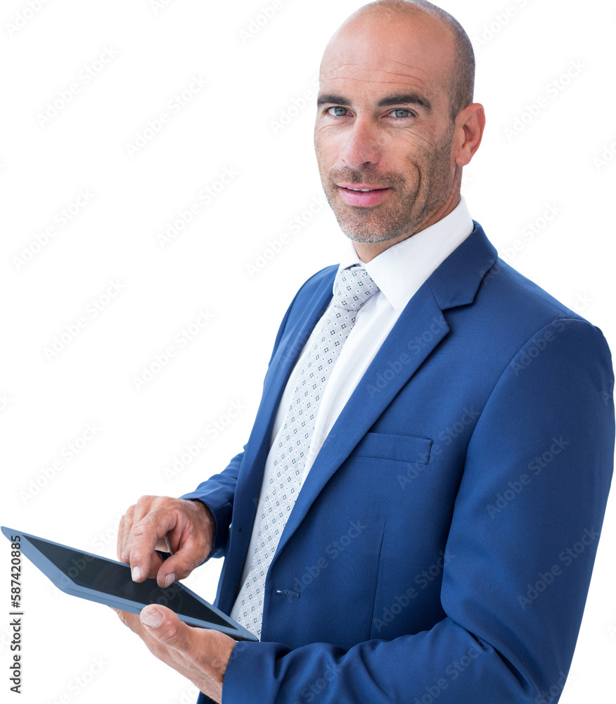 businessman using a tablet and smiling at the camera 