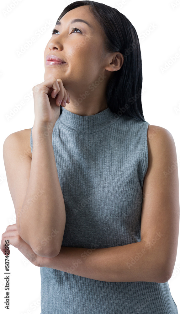 Thoughtful woman with hand on chin looking up Thoughtful woman with hand on chin looking up