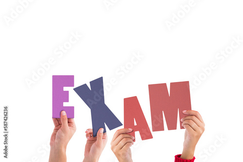 Cropped hands holding colorful word exam