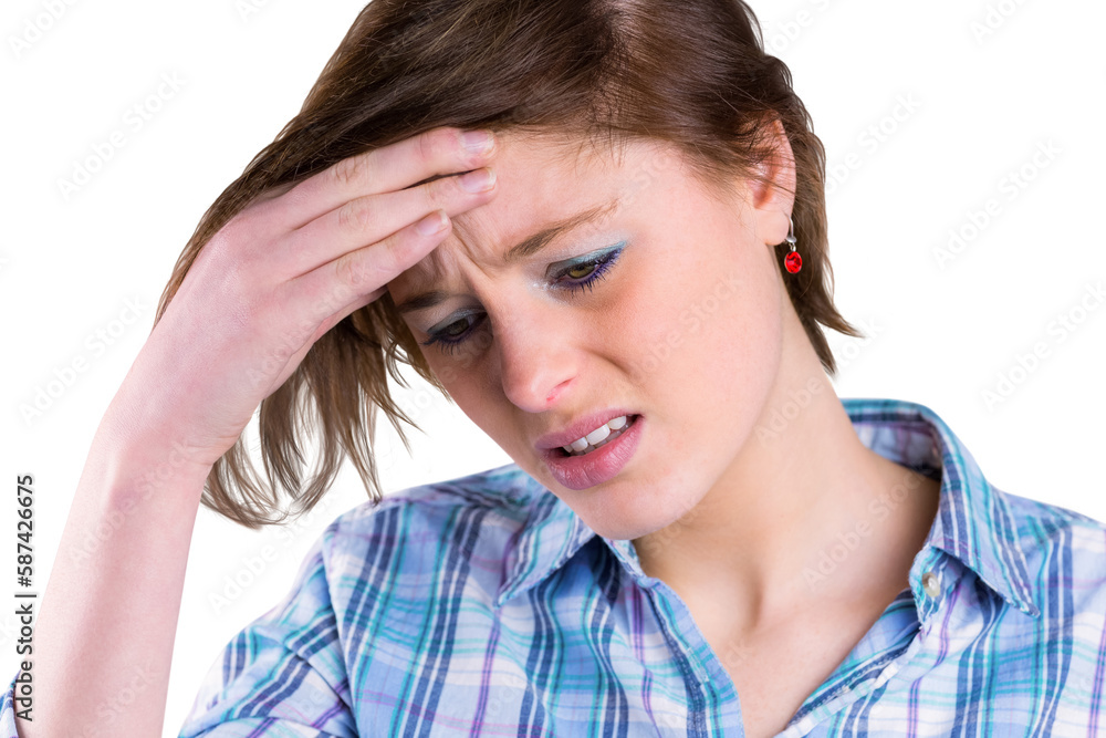 Pretty brunette getting a headache with hands on head Pretty brunette getting a headache with hands on head