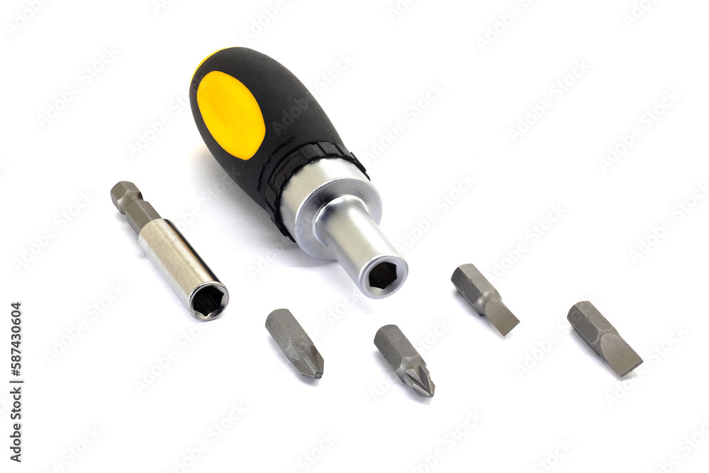 Screwdriver with interchangeable bits on white isolated background Screwdriver with interchangeable bits on white isolated background