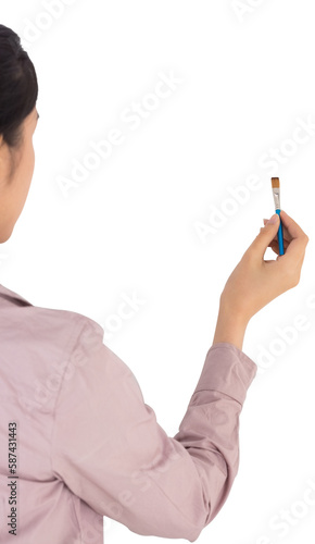 Businesswoman holding a paint brush
