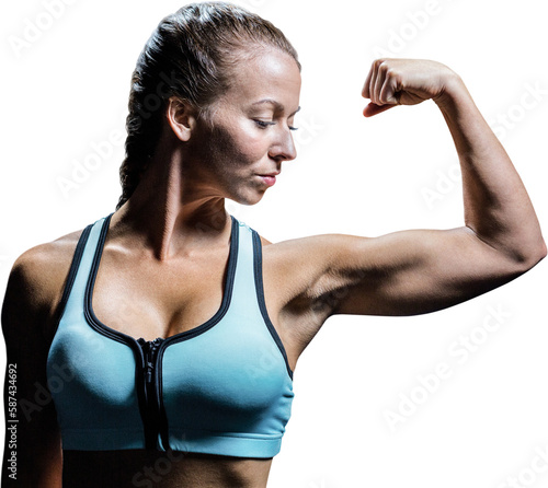 Fit woman flexing muscles