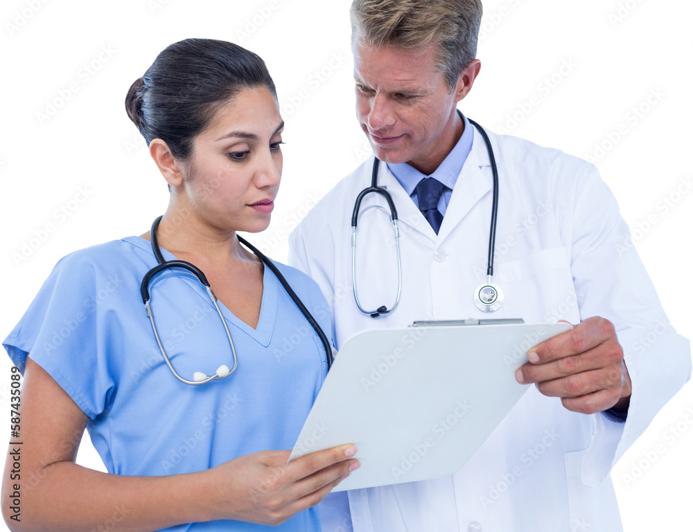 Male doctor with nurse discussing over clipboard Male doctor with nurse discussing over clipboard