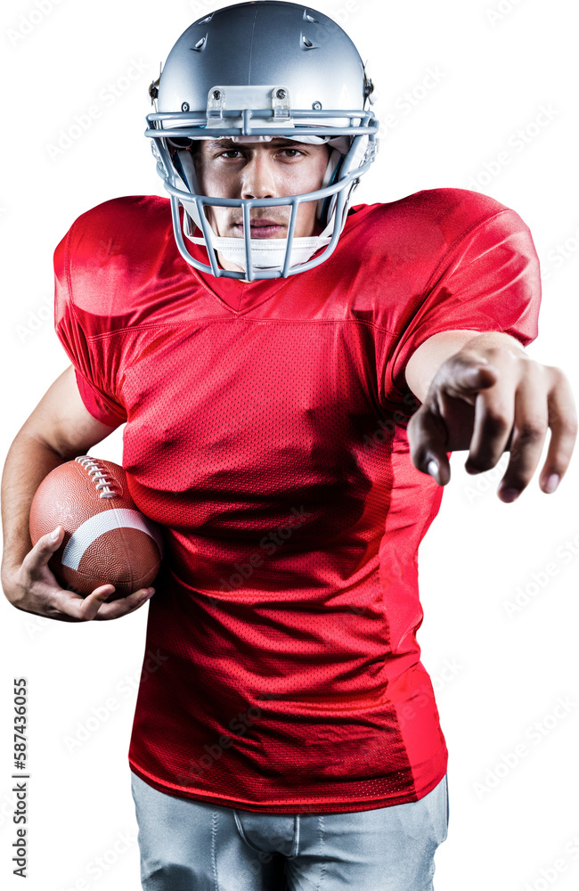 Portrait of sportsman pointing while holding American football