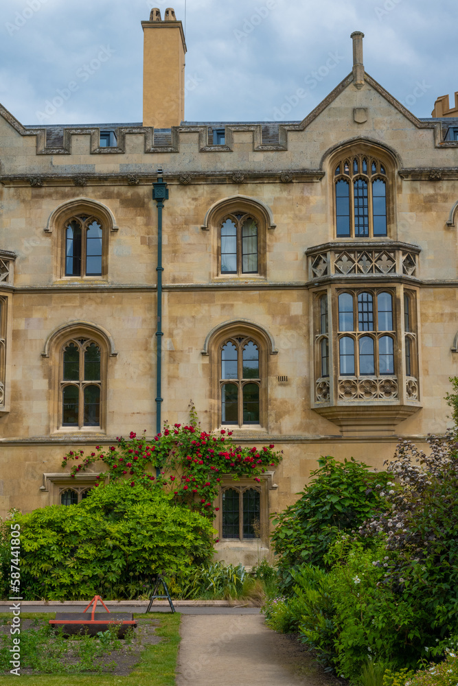 Medieval architecture and historical windows of Nevile's Court at Trinity College in Cambridge Medieval architecture and historical windows of Nevile's Court at Trinity College in Cambridge