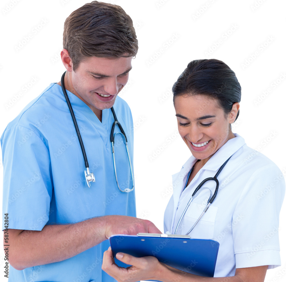 Smiling doctors looking at writing writing pad Smiling doctors looking at writing writing pad