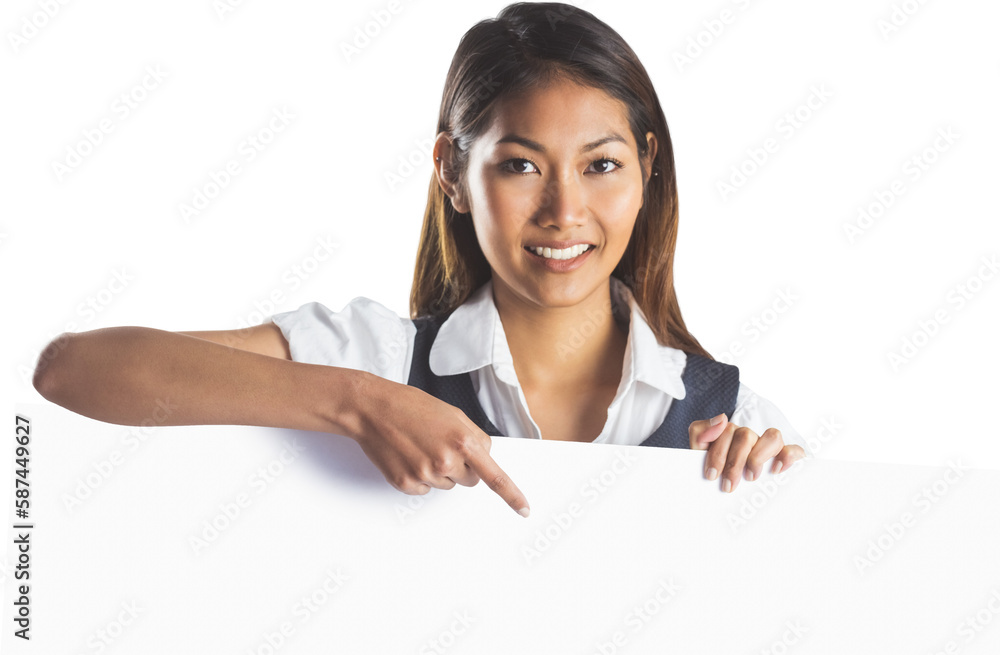 Smiling businesswoman pointing a white poster Smiling businesswoman pointing a white poster