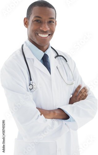 Smiling doctor with arms crossed in a medical office