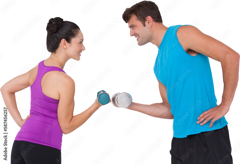 Fit man and woman lifting dumbbells Fit man and woman lifting dumbbells