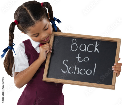 Schoolgirl holding writing slate with text