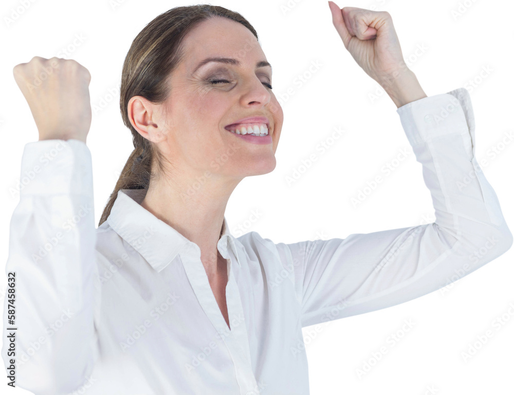 Successful businesswoman clenching fists with eyes closed Successful businesswoman clenching fists with eyes closed