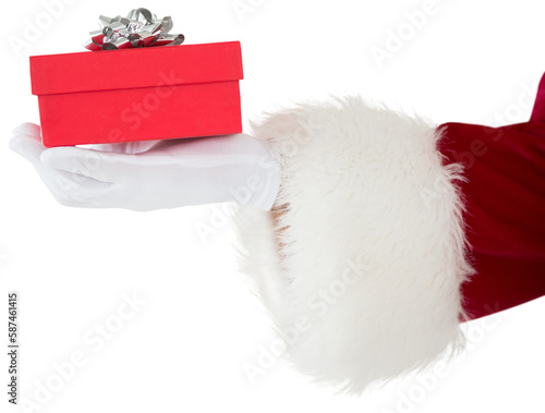 Hand of santa claus holding a gift