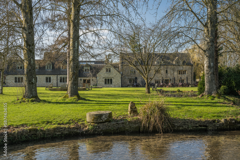 River Eye and Traditional buildings in Lower Slaughter in Cotswolds England