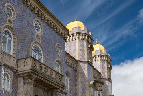 Sintra, Lisboa, Portugal. October 4, 2022: Facade and architecture of the Pena Palace with blue sky.