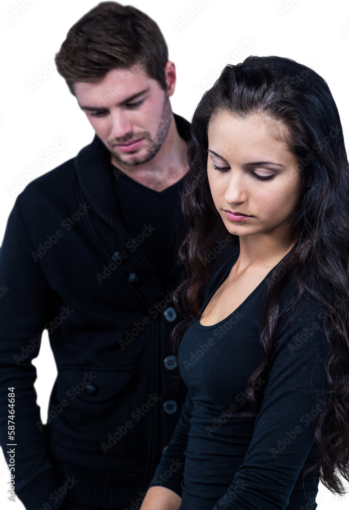 Upset couple looking down Upset couple looking down