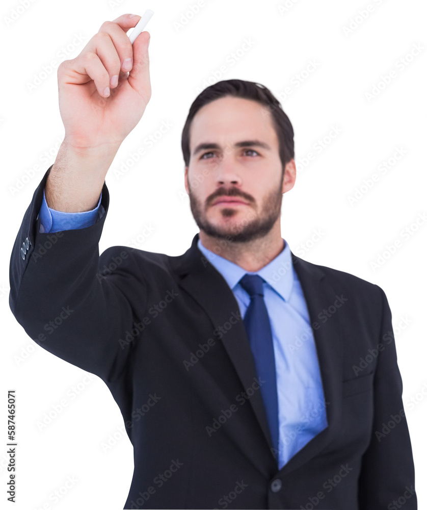 Businessman holding a chalk and writing something Businessman holding a chalk and writing something