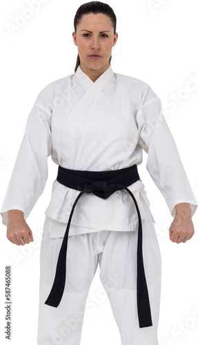 Female karate player posing on white background