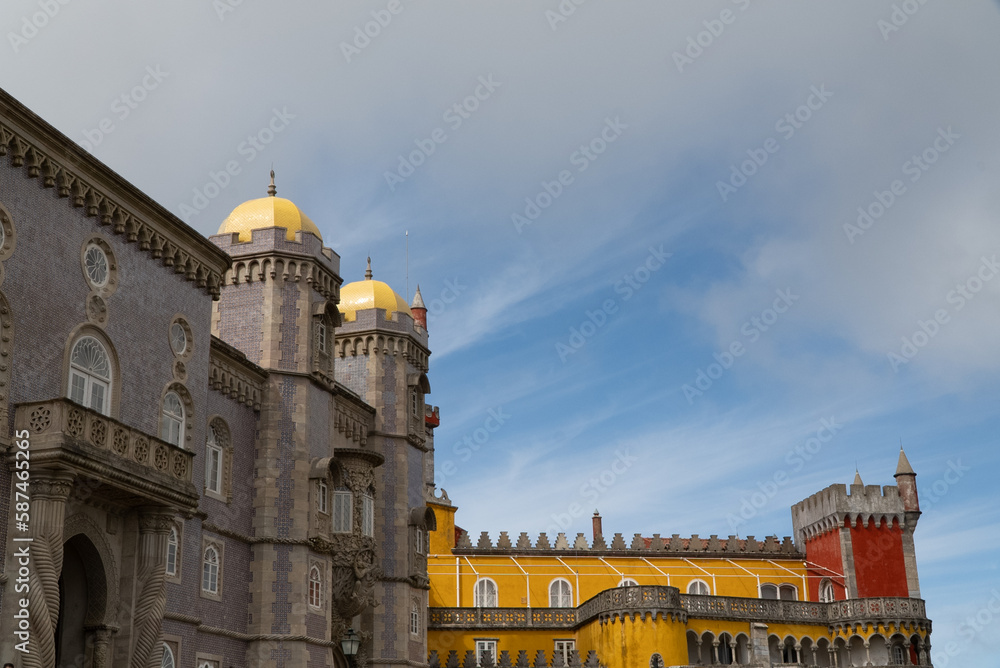Sintra, Lisboa, Portugal. October 4, 2022: Facade and architecture of the Pena Palace with blue sky.