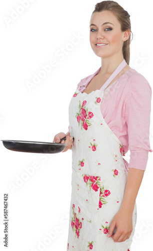 Maid in apron holding frying pan