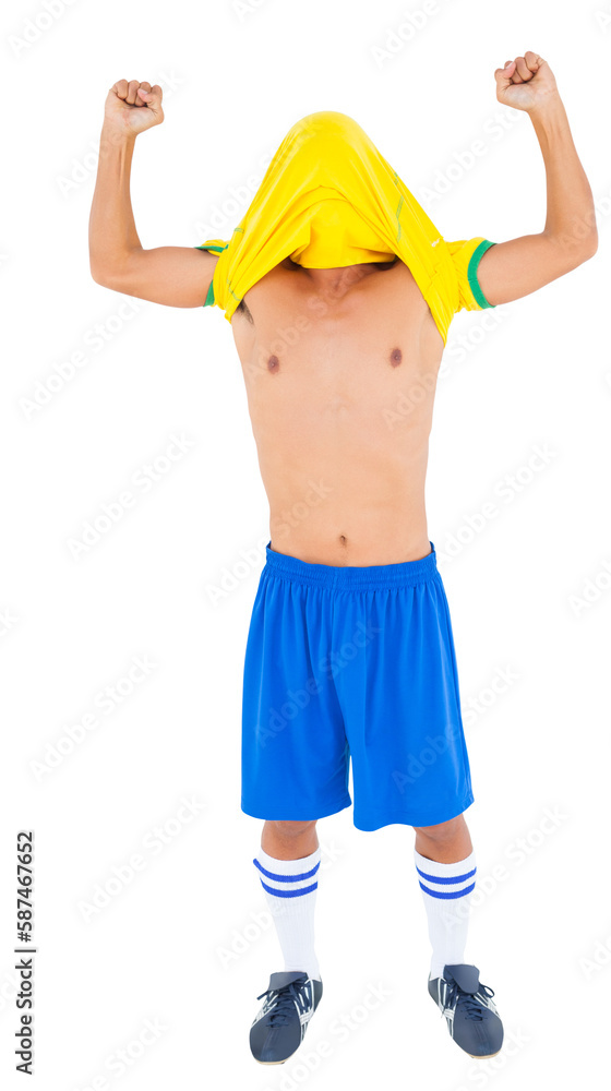 Football player cheering with overhead shirt
