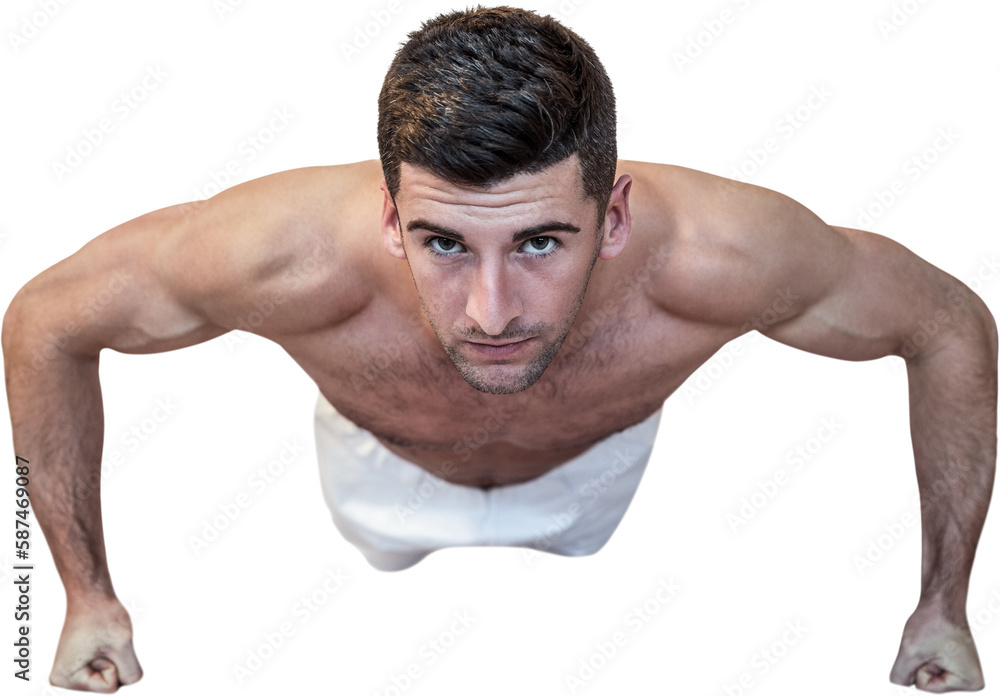 Man doing push up with clenched fist Man doing push up with clenched fist